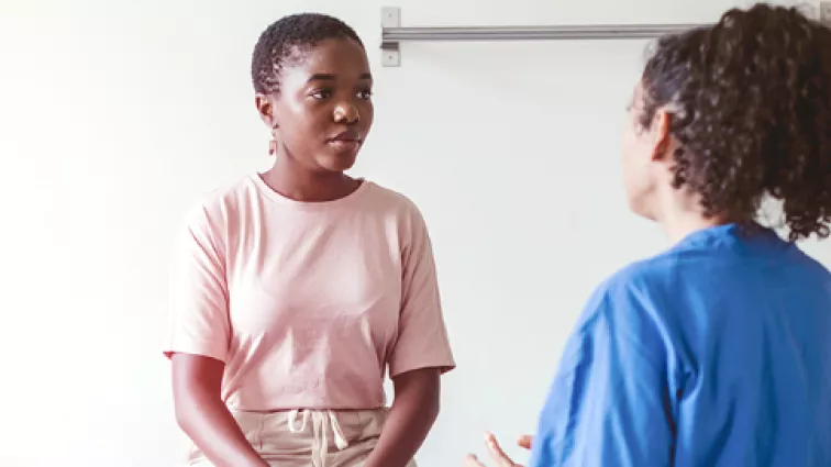 Patient talking to a nurse