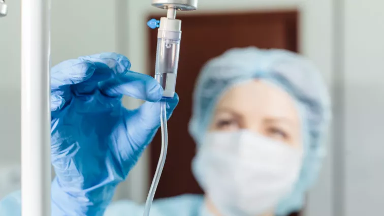 Nurse with IV drip line 