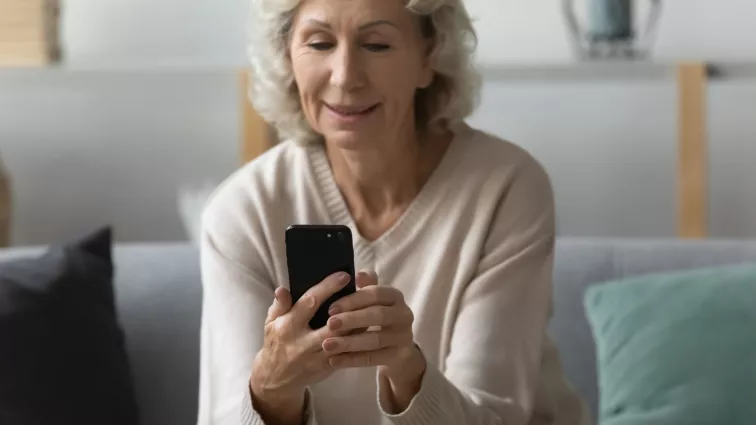 Woman looking at cell phone